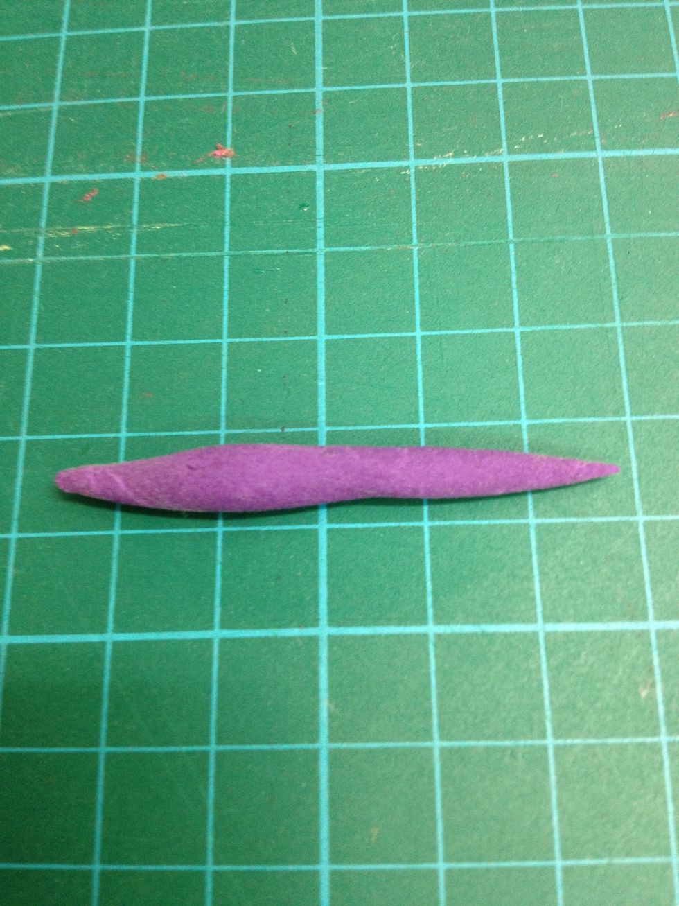 Take a small piece purple clay. Roll into sausage.