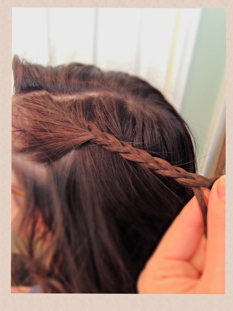 Take a small section of your hair from one side of your hair, and repeat steps 4-7 for a side braid.