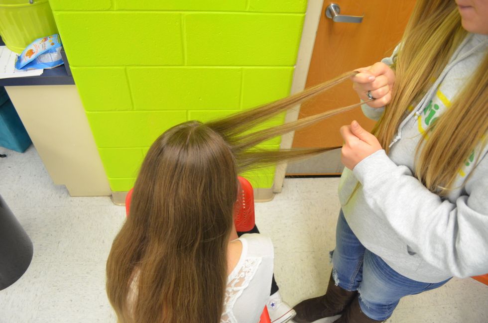Take a small section out of the front right part of your head and split it into 3 equal parts like you are starting a normal braid.