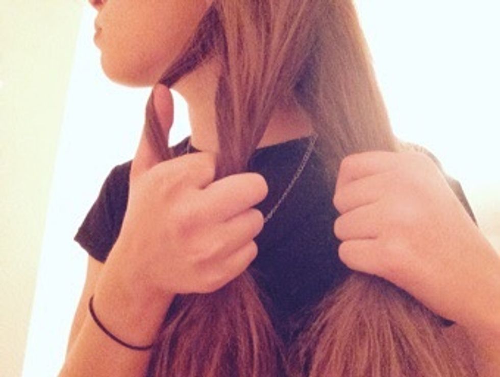 Take a small strand from one side