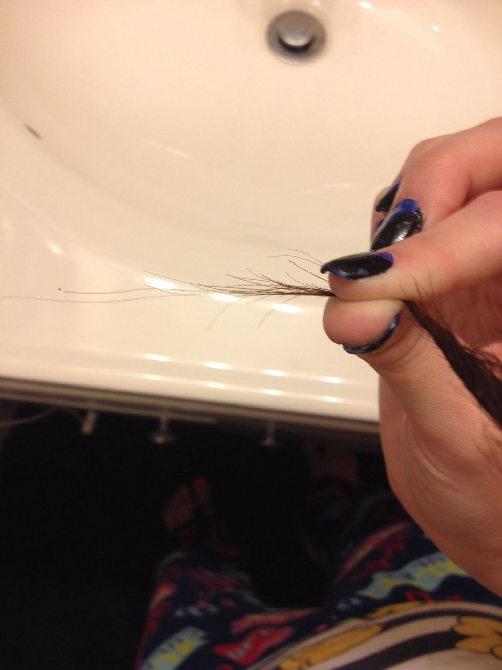 Take a small strand of hair at the bottom of your twist and you will hold this ONE piece with one hand and use your other hand to pull up the other hair....