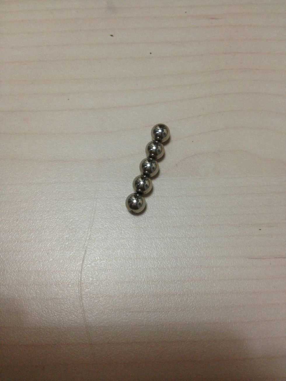 Take a strip of 5 balls
