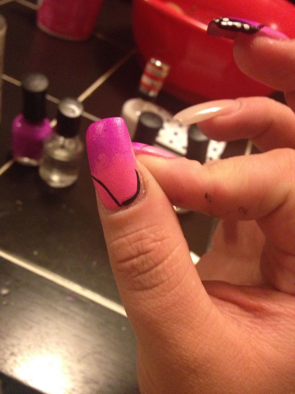 Take a Striper and take a curved line at the border of the nail