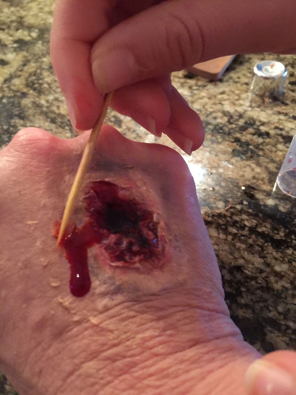 Take a toothpick, and clean up any of the make-up or blood that looks unnatural.