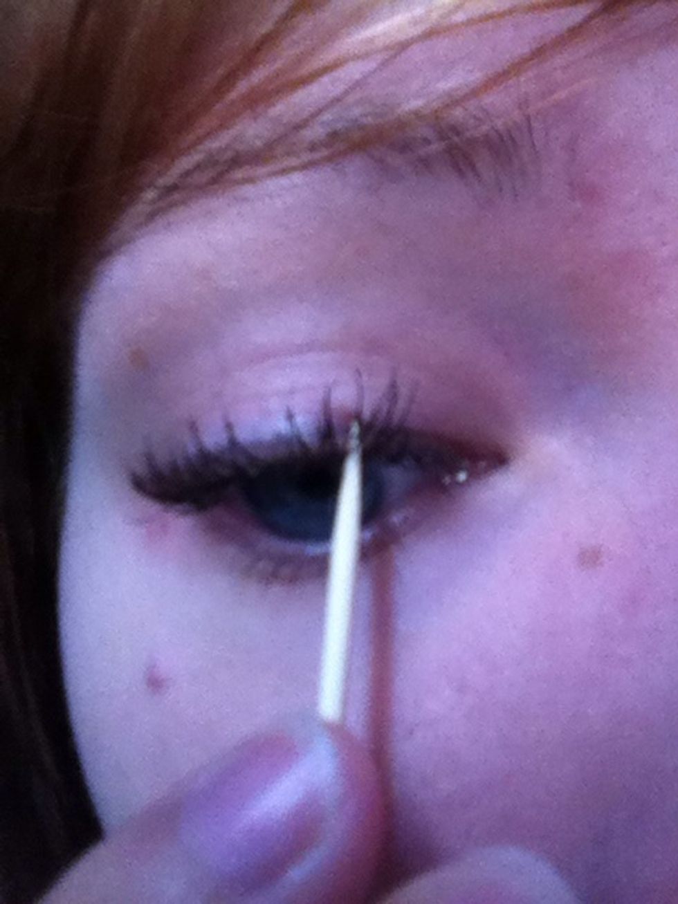 Take a toothpick and insert it at the base of where two eyelashes intersect. Be careful not to poke your eye! \ud83d\ude48