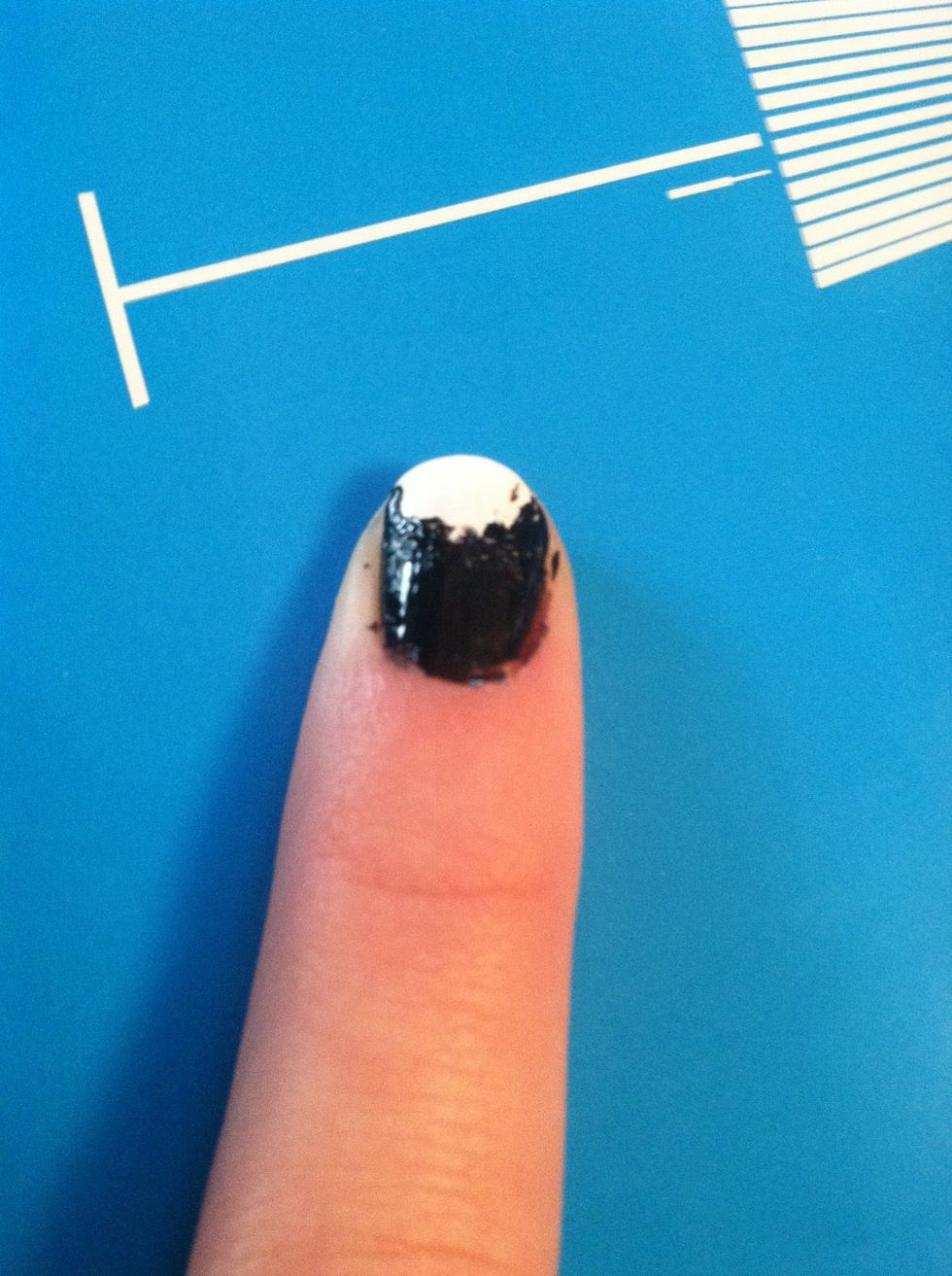 Take a toothpick or dotting tool and put black around the white to make a semi-circle.