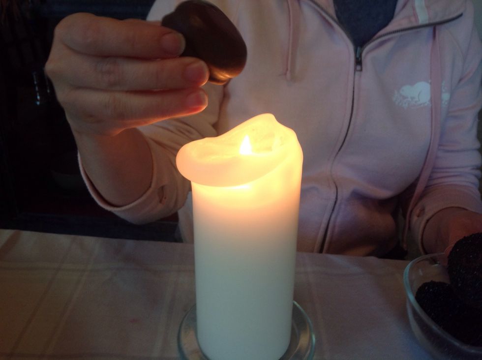 Take a Viva Puff cookie (these go by different names in different counties - Mallomars, Wippets, or even Tunnock's Tea Cakes in UK)...VERY carefully heat so chocolate coating is just melting.