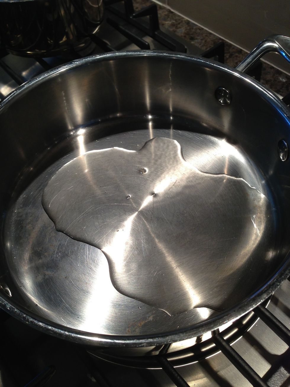 Take about 3 tbsp of the oil used to fry the tofu and put it in the saut\u00e9 pan. Heat up the oil on med-high heat