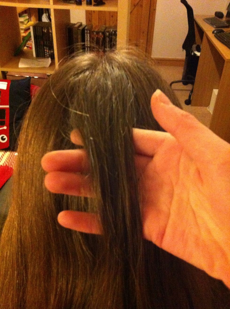 Take about this much hair from the top of your head.