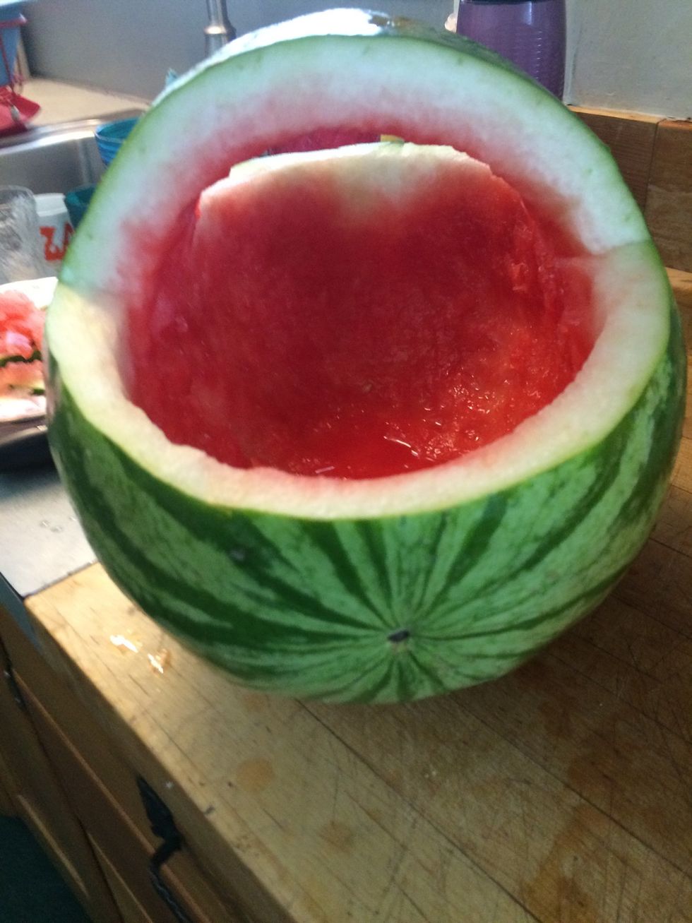 take all remaining inside chunks out with your spoon and make inside of the watermelon as smooth as possible