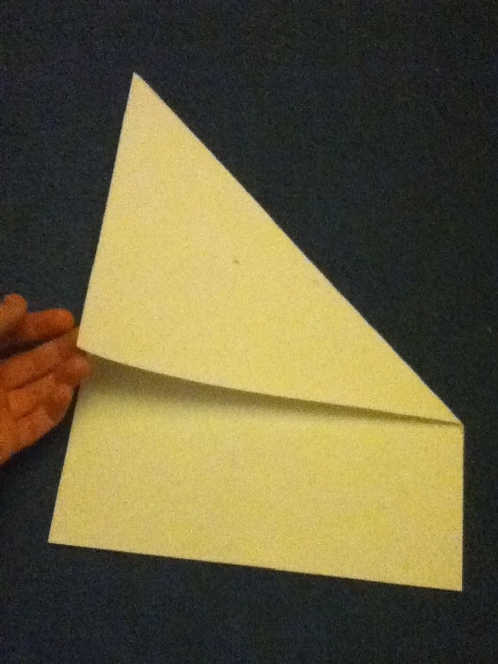 Take an a4 piece of paper and fold a triangle like this