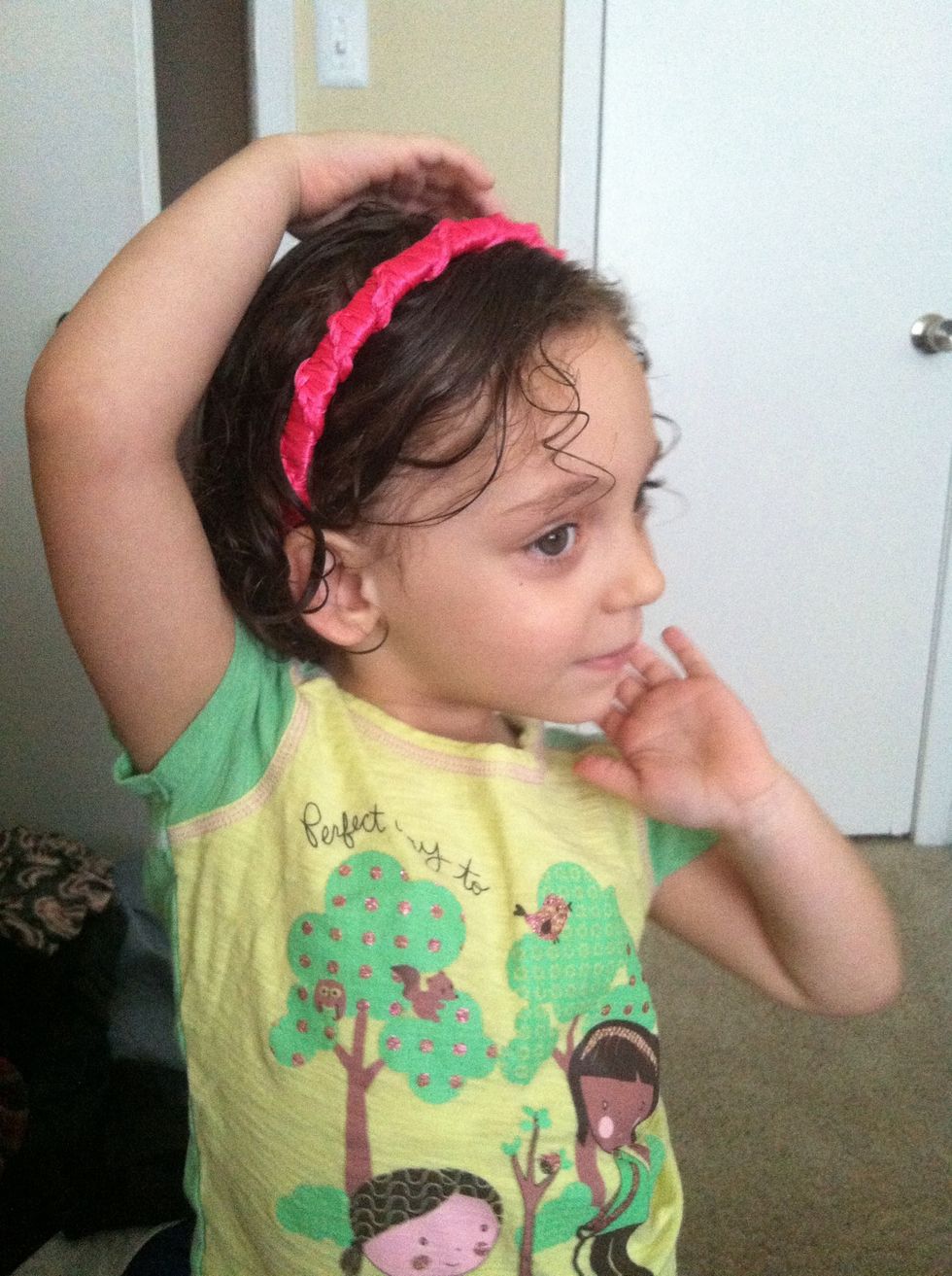 Take an adorable picture of your kid wearing it and tell her to pose.