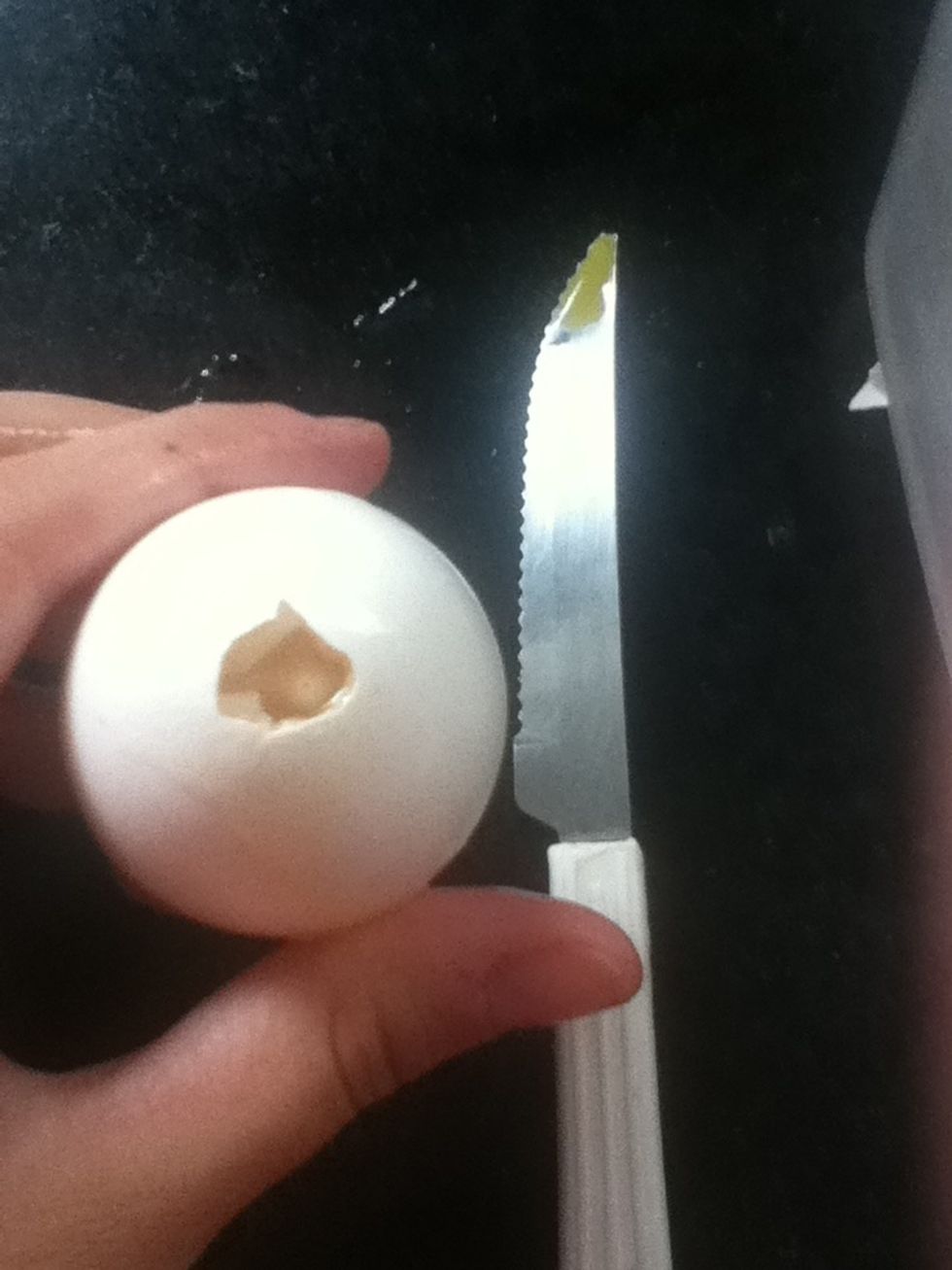 Take an egg and make a small hole.