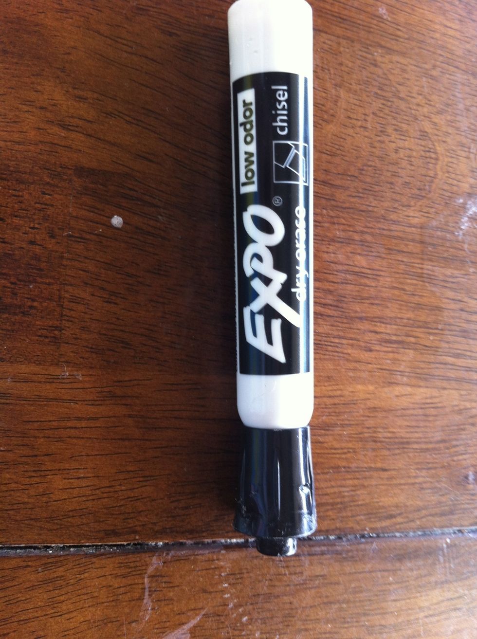 Take an expo marker and color over it