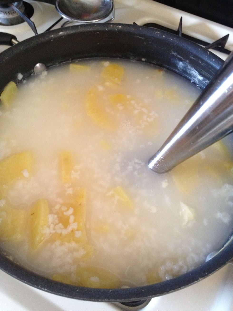 Take an immersion blender and blend until smooth. You can also do this in a blender no problem. :)