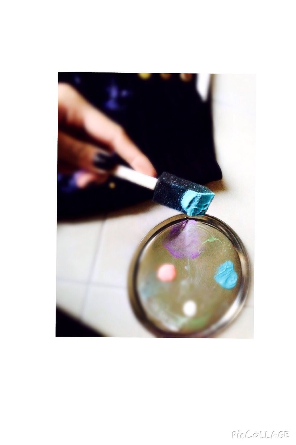 Take another sponge and load it with the blue fabric paint.