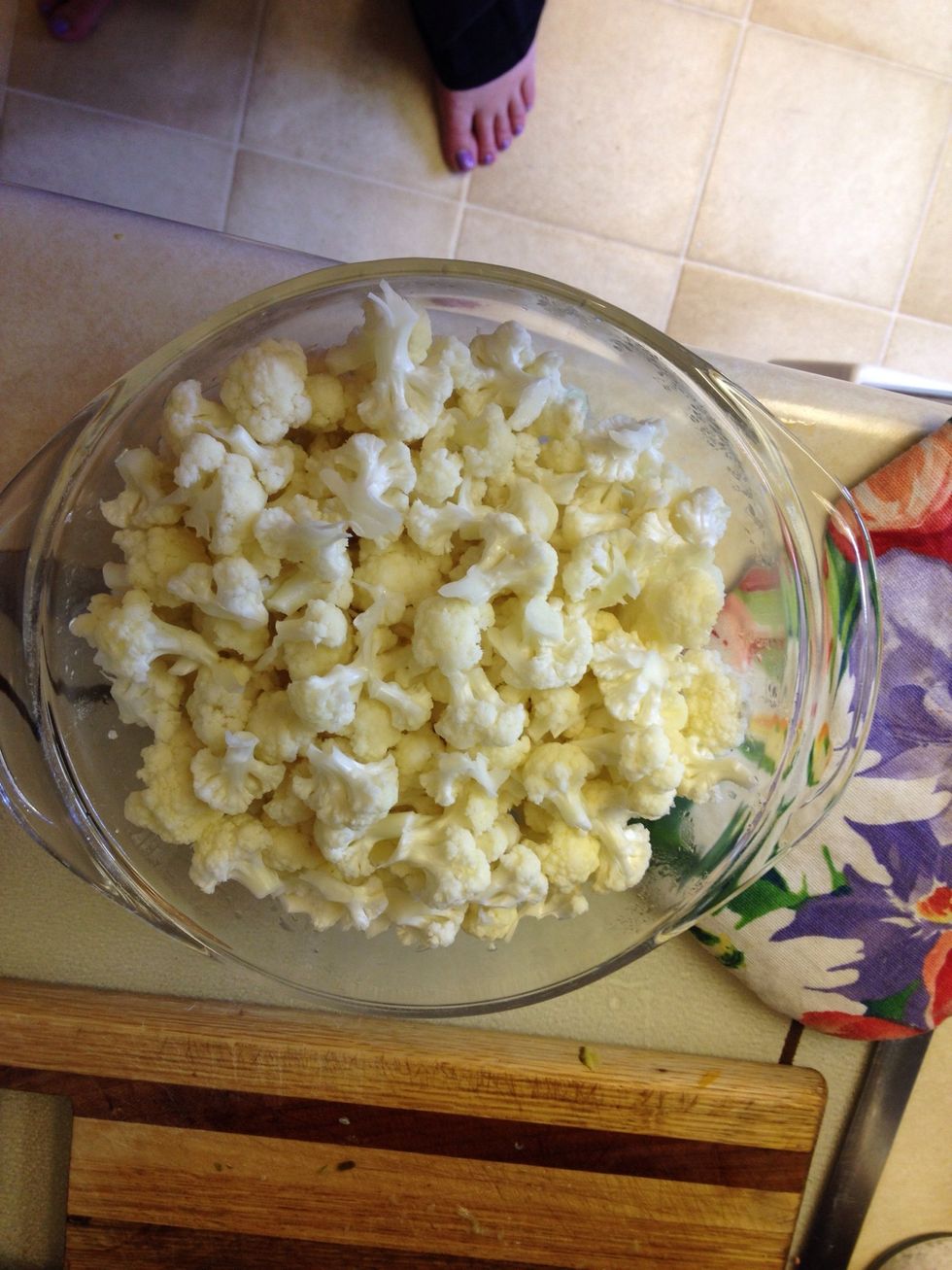 Take apart the cauliflower by hand in small pieces. Add a bit of water. Cook in microwave for a few minutes. Don't cook fully. And don't forget it in the microwave! Have done this twice!