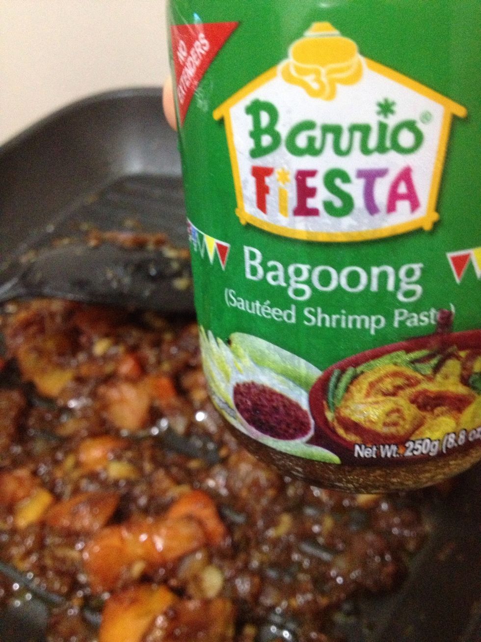 Take as much BAGOONG (shrimp paste) as you desire. I placed 2 biiig spoon-fulls. Stir it all around until tomatoes and shrimp paste make some sort of "sauce".