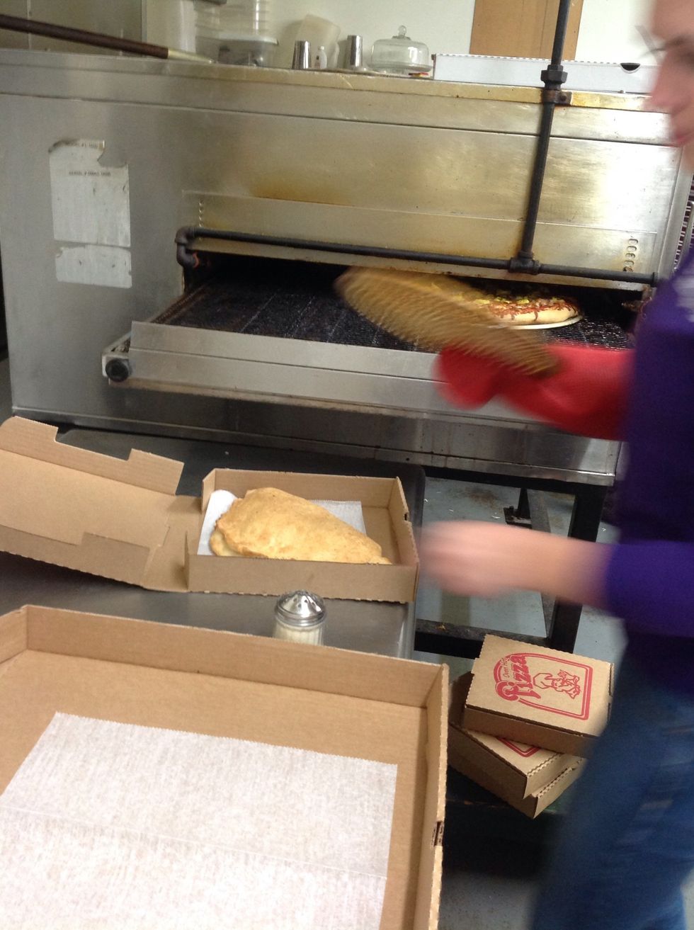 Take calzone off screen and put in box