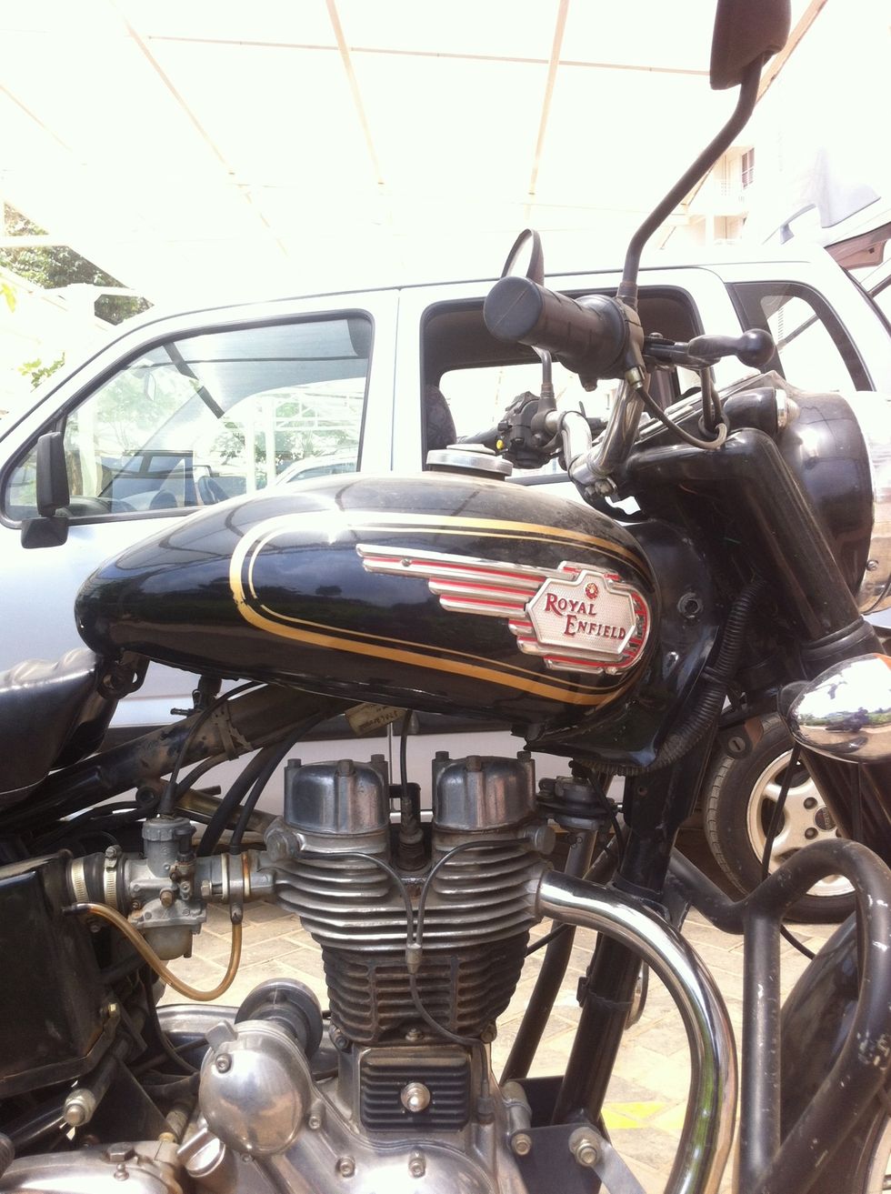 Take care that your handle bar bolts don't scratch the tank, cover the tank with cloth if you want to protect paint job.