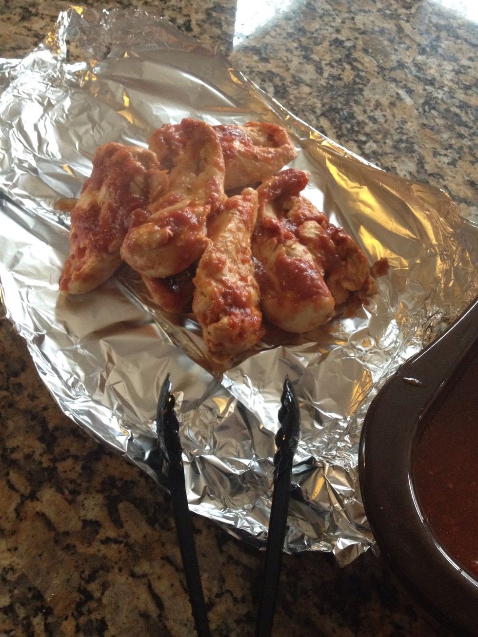 Take chicken out and lay on the foil. Once it has rested for 20 minutes, it will cool enough to start shredding