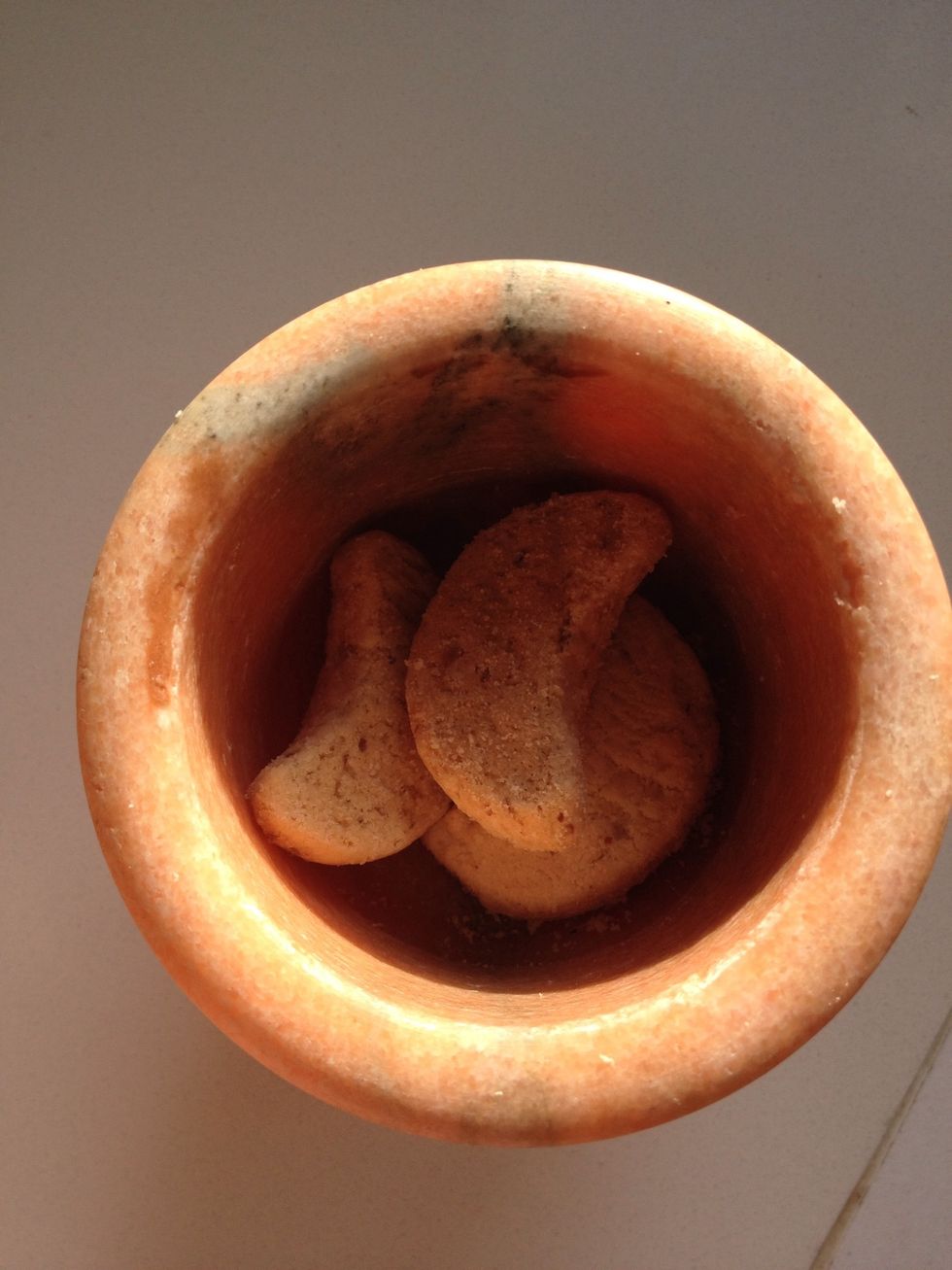 Take cookies and break them into small pieces