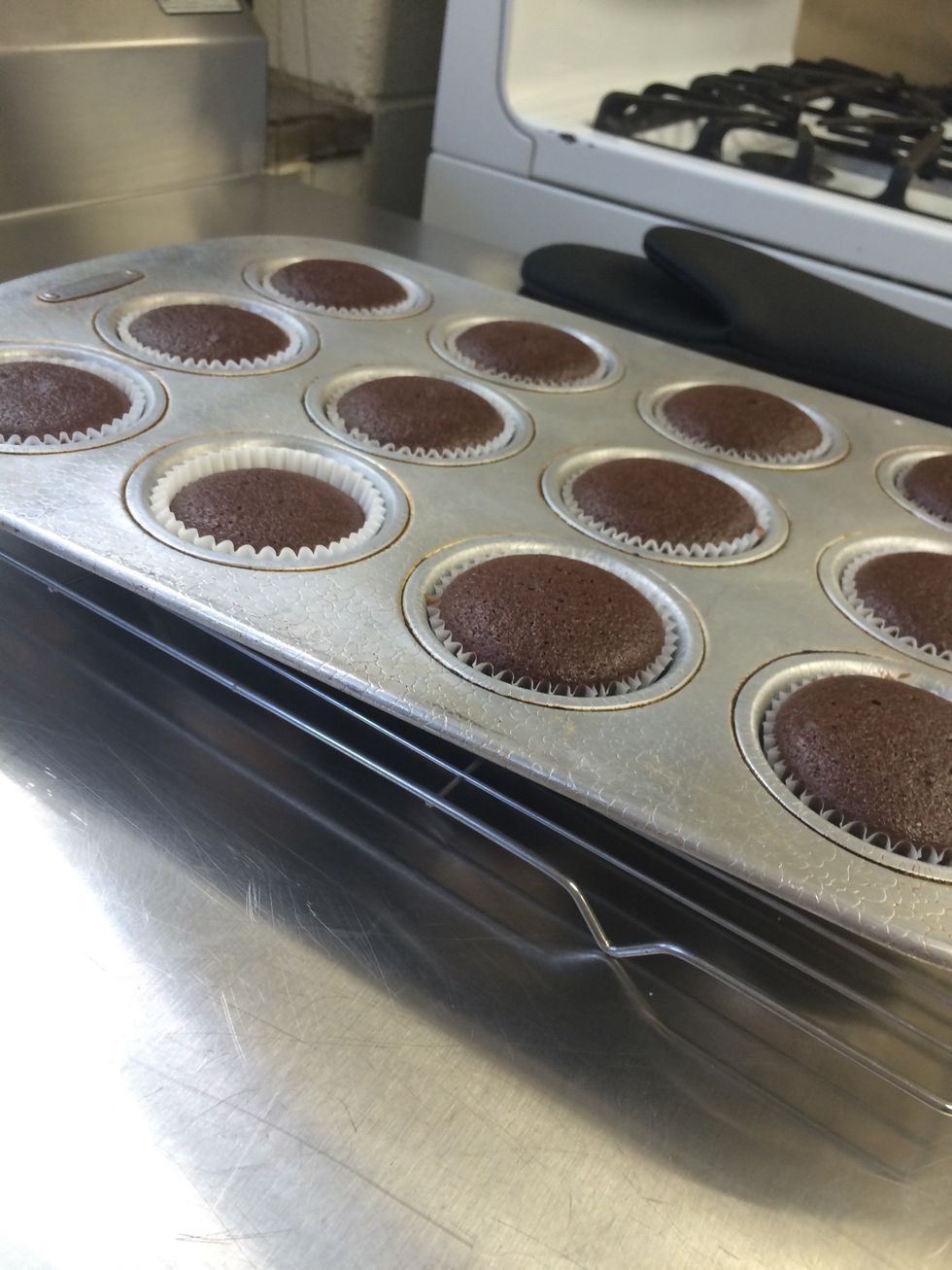 Take cupcakes out of oven, place on cooling rack, and allow time to cool (Place in an air-tight container if you plan on making these on different days).