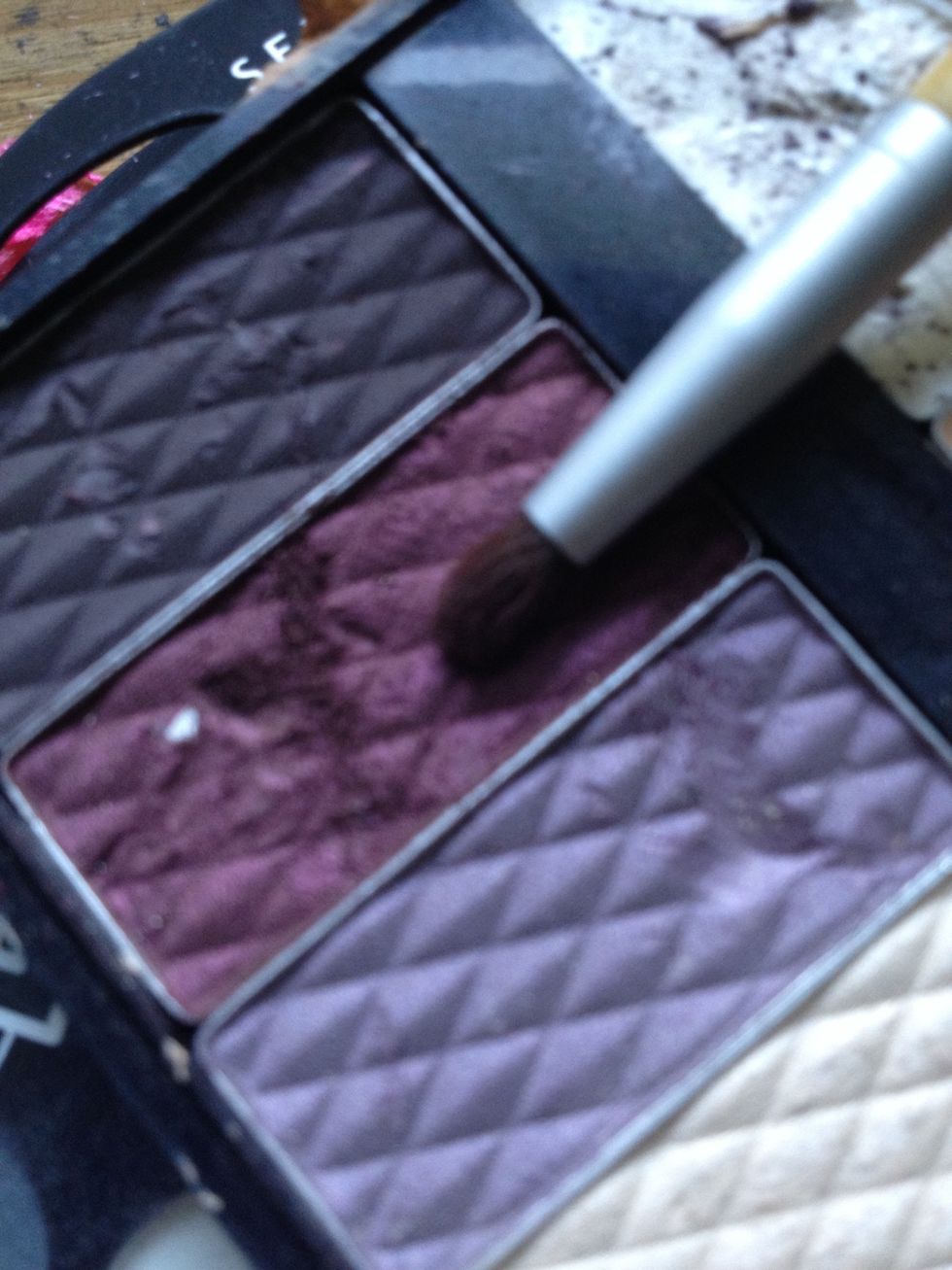 Take dark purple on smudging brush.