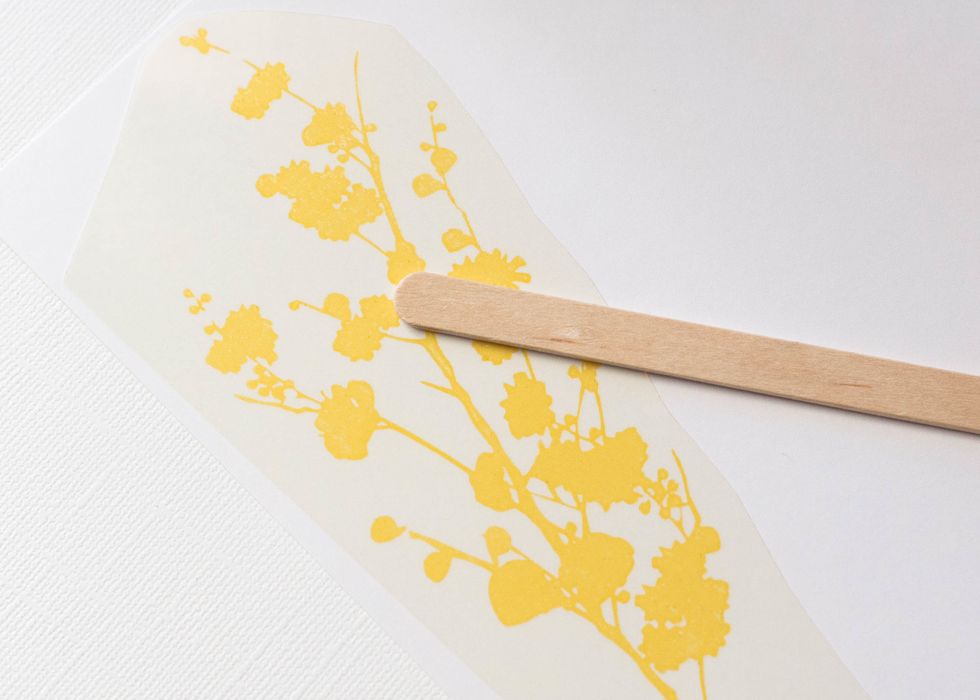 Take desired shape/word and cut it out of the sheet. Rub it on to cardstock (or project) using the stick included, or your finger.