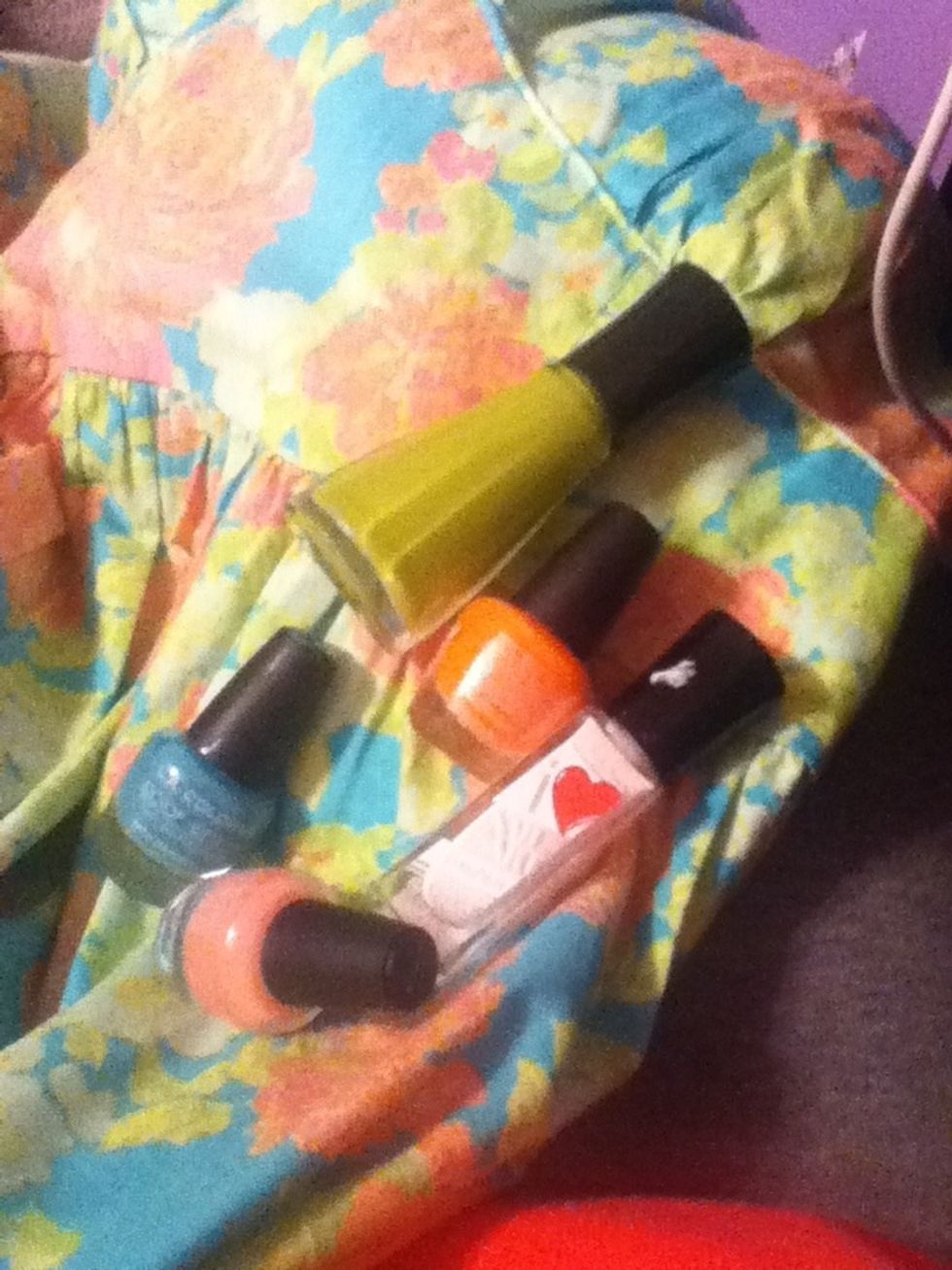 Take each color nail polish your dress has in it and hold it up to your dress. The ones that math most are the ones you use. This is my dress and the polishes i am using.