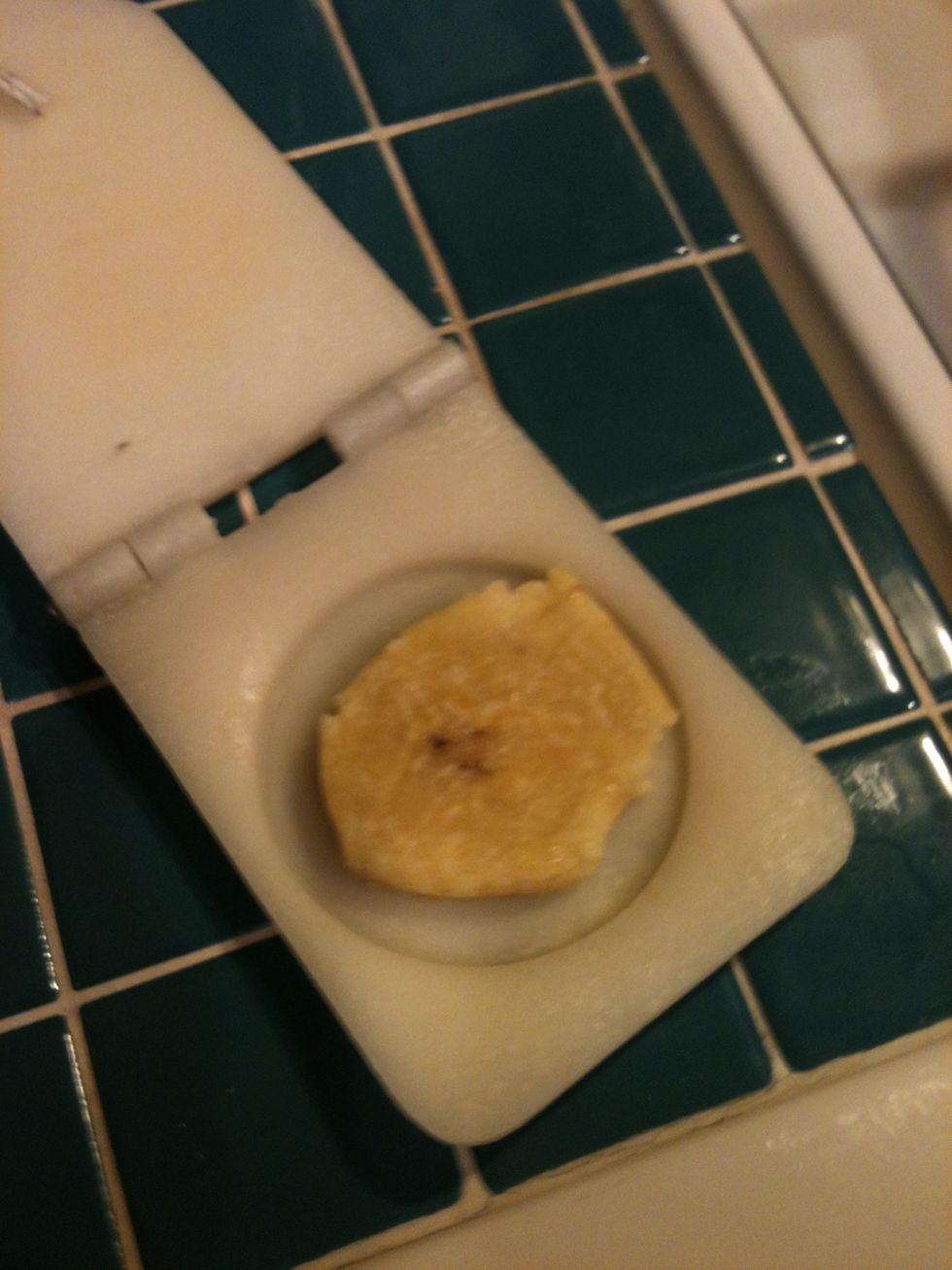Take each slice and press them. A cooked plantain shouldn't break but flatten smoothly
