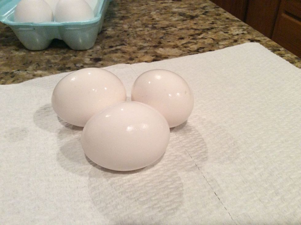 Take eggs out of refrigerator. Place eggs on a piece of paper towel or something to keep surface clean when dying