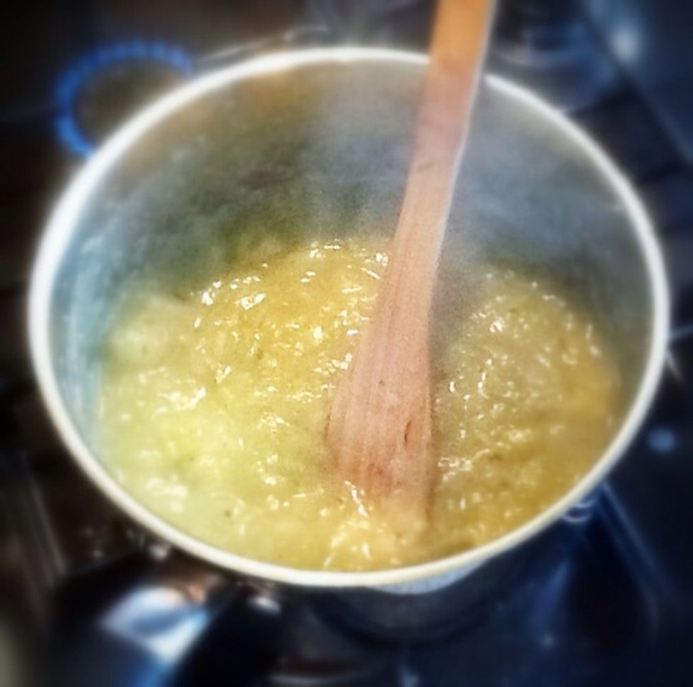 Take half the soup, and blend it up in a food processor or blender until nice and smooth. Pour the smooth mixture back into the pan.  Blend it all if you like a completely smooth soup! :)