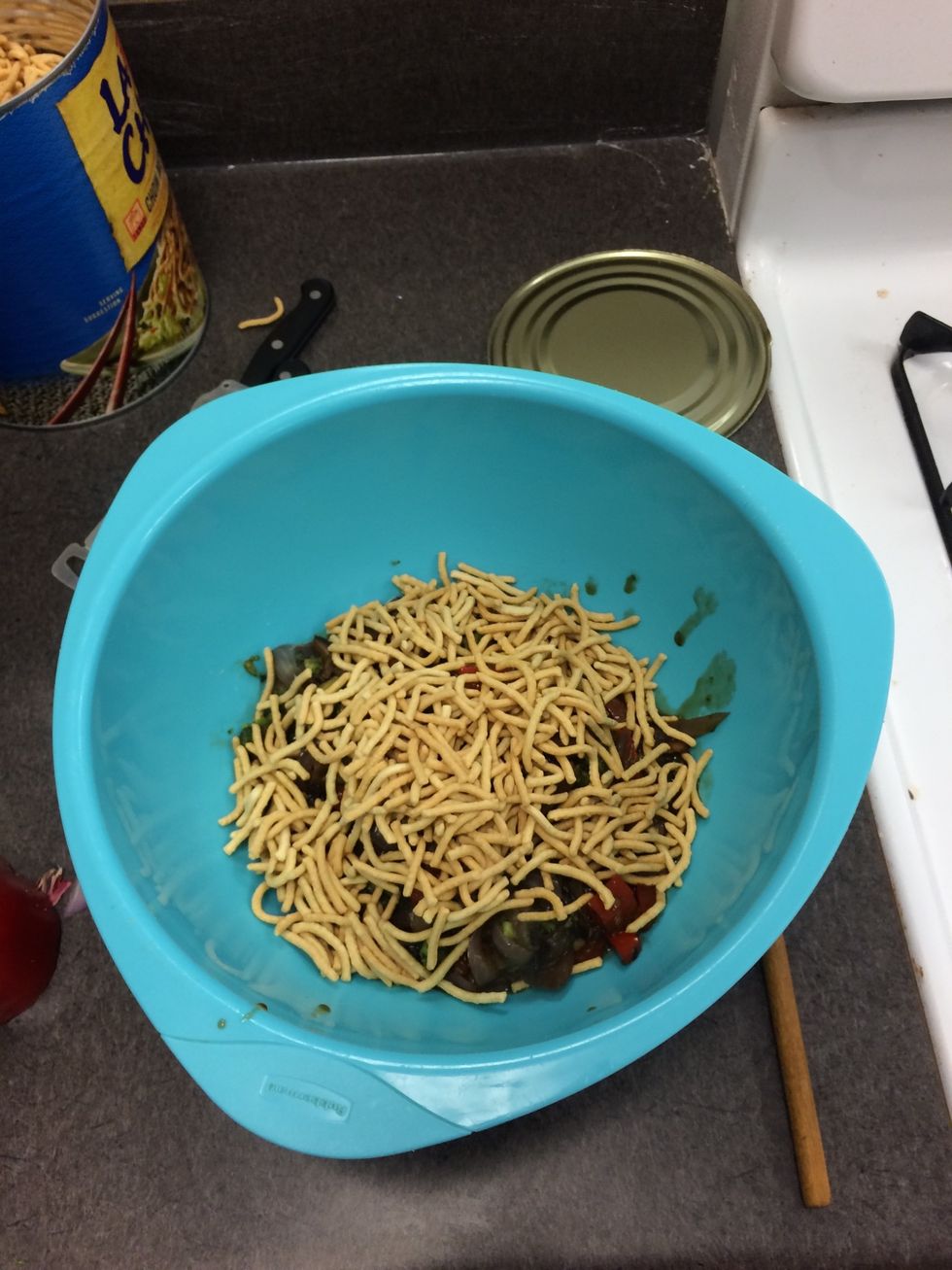 Take ingredients off pan and put in large bowl. Add chow mein noodles on top of other food