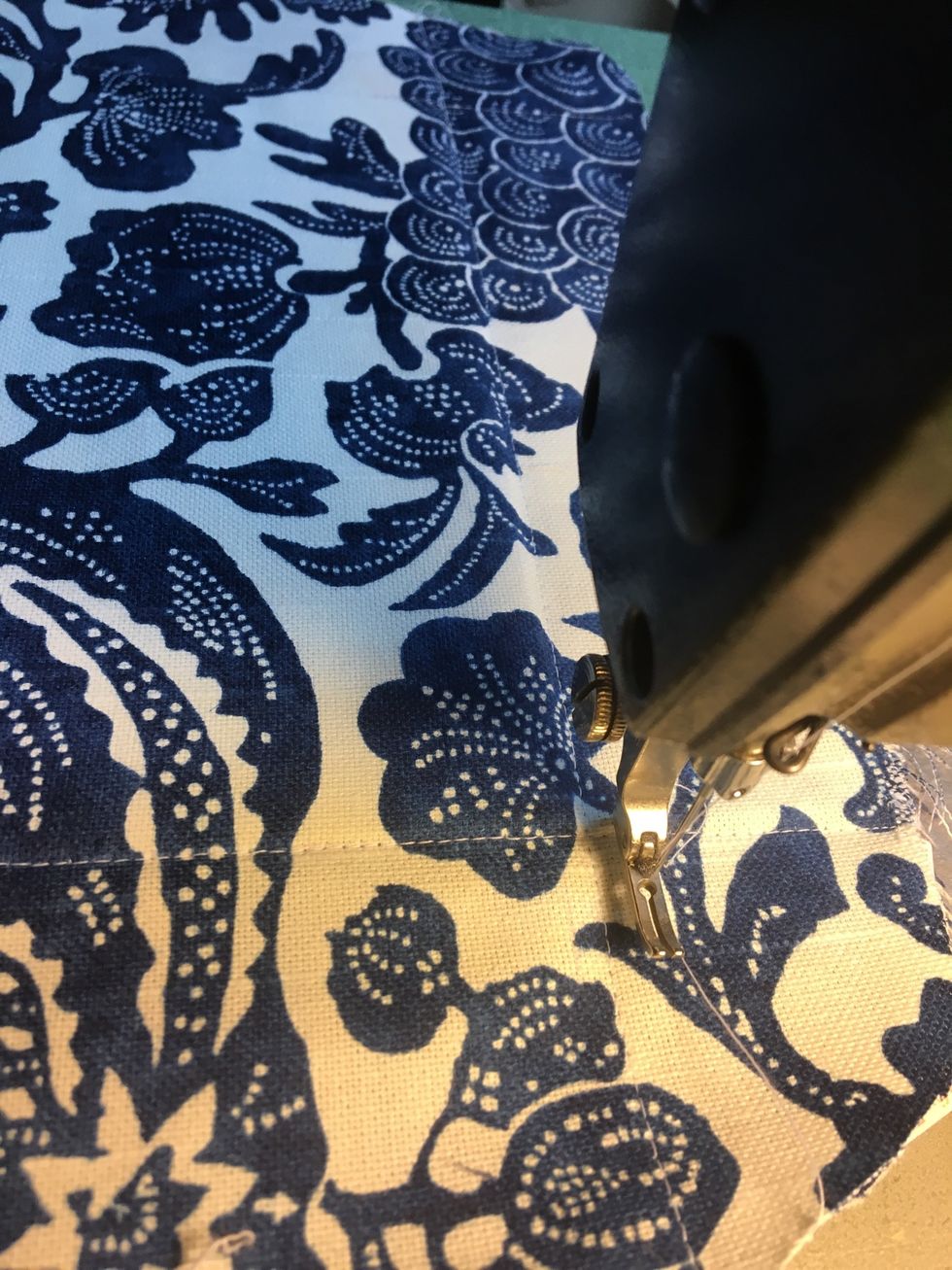 Take it back to the machine and stitch across the entire side as you have done before, stitching as close to the plastic insert as possible without stitching over it.