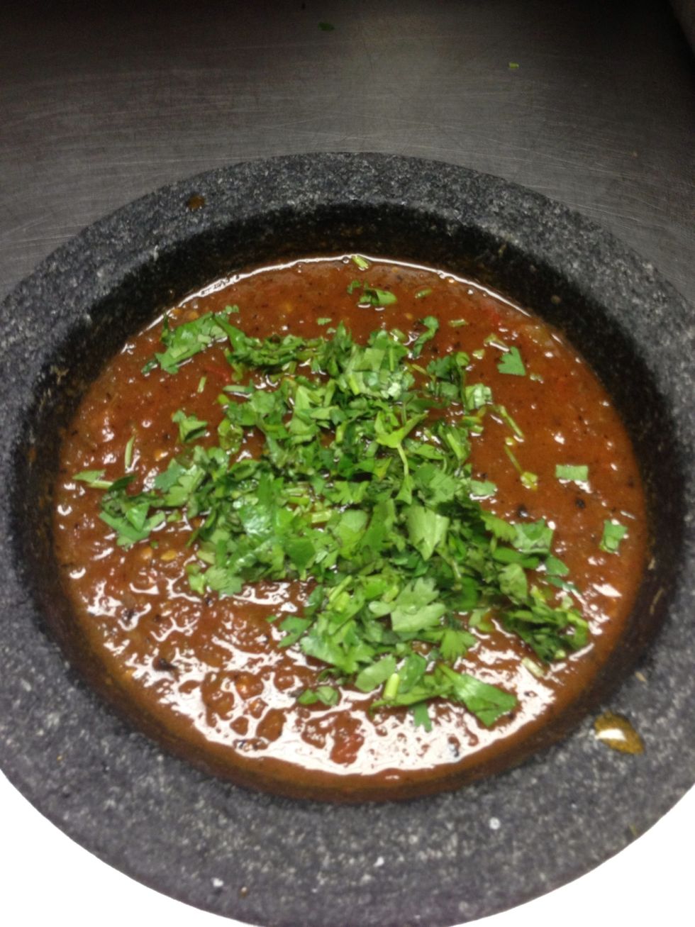 Take it off the fire and add the cilantro and mix it together