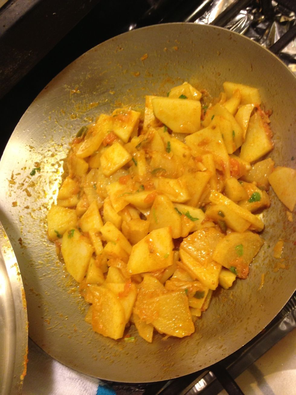 Take it off the heat. (And don't forget to turn off the oven-bad memories..) and let it sit for 5-10 minutes.