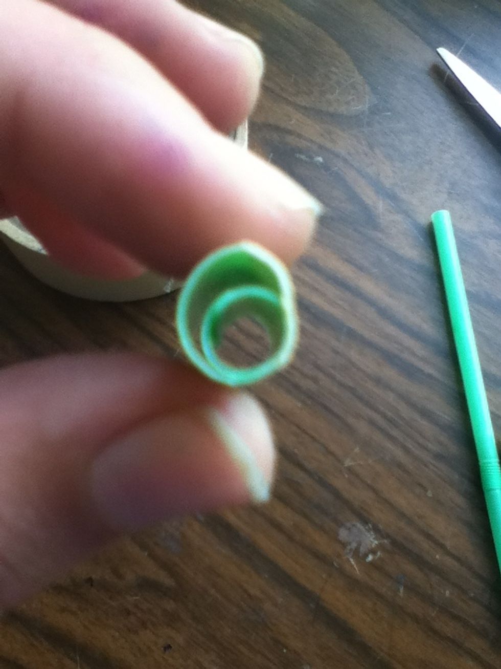 Take it off your pencil then ,trim the tape off the top and bottom it should look like this from the top. Slip it over the top of your pencil