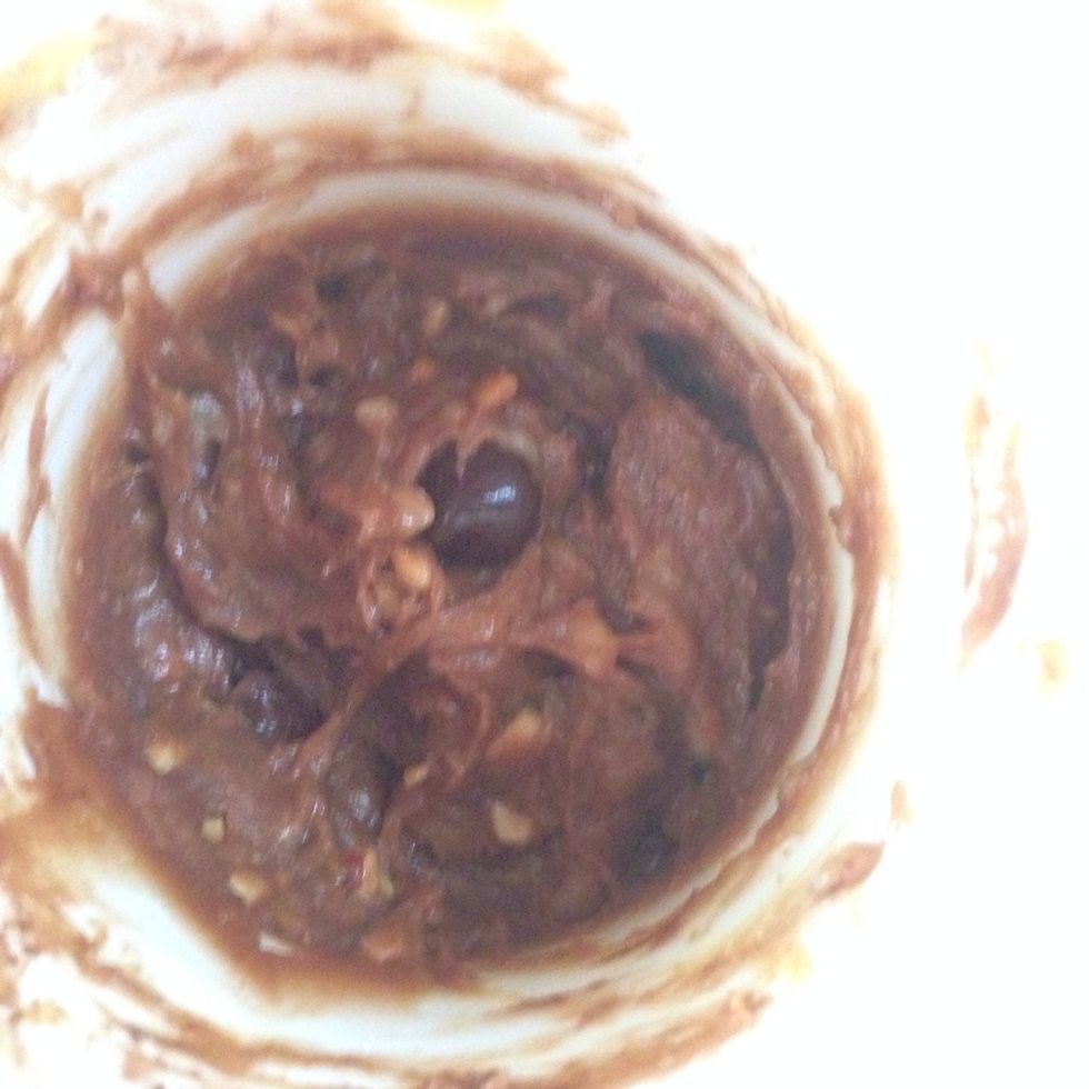 Take it out and mix it up nicely. Put it back in the microwave for another minute.