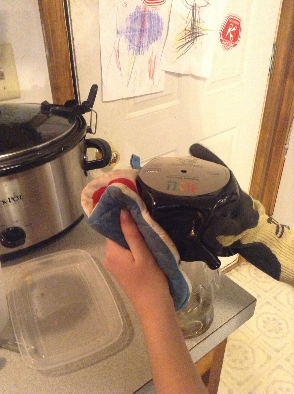 Take it out and squeeze the sides so it hugs the vase and let it cool.