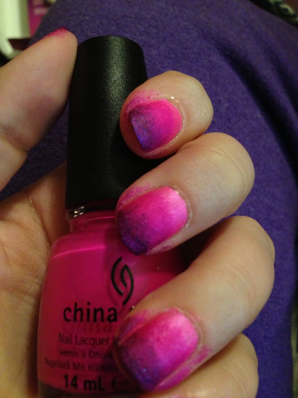 Take middle color and blend with the sponge into to purple