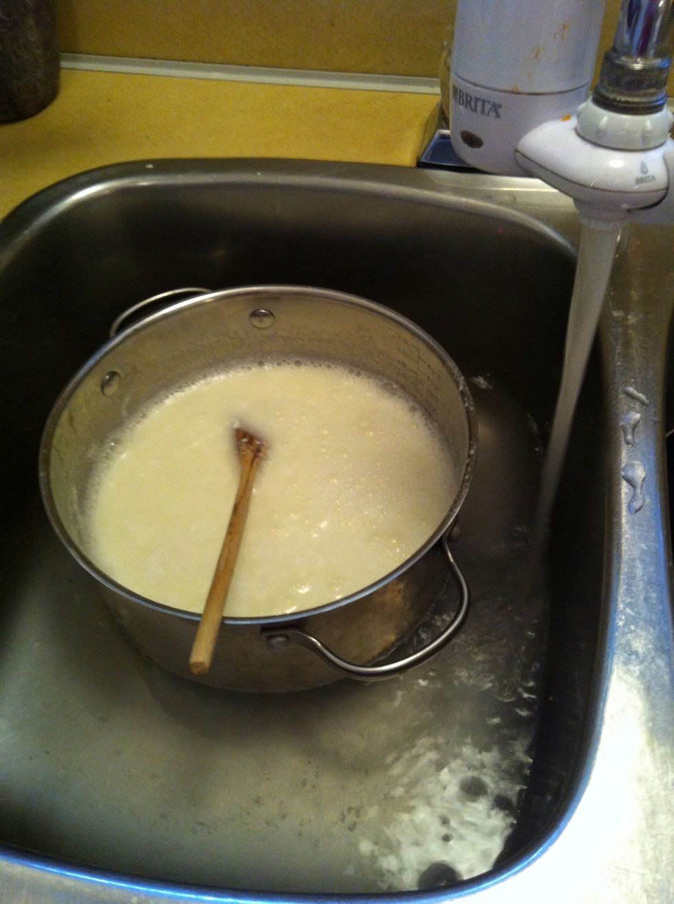Take milk off the stove, and bring the temperature down to 110F (You can use a cool bath like the picture)