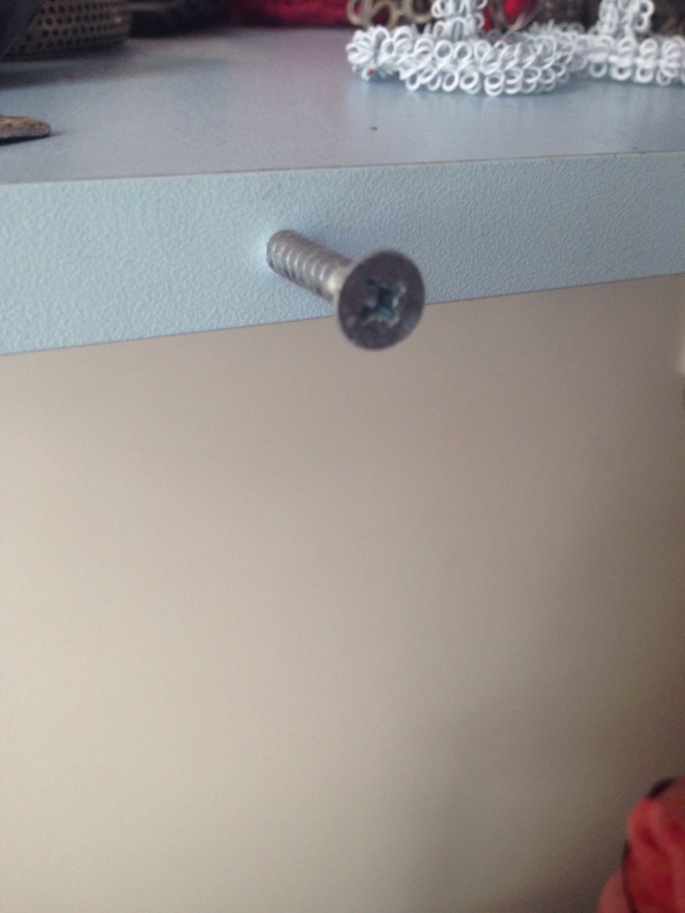 take min. 1 inch/3cm screws and screw them on the edge of the shelf. consider the spacing (2 inches/5cm is good in my opinion). also consider what you have underneath the shelf and the access.