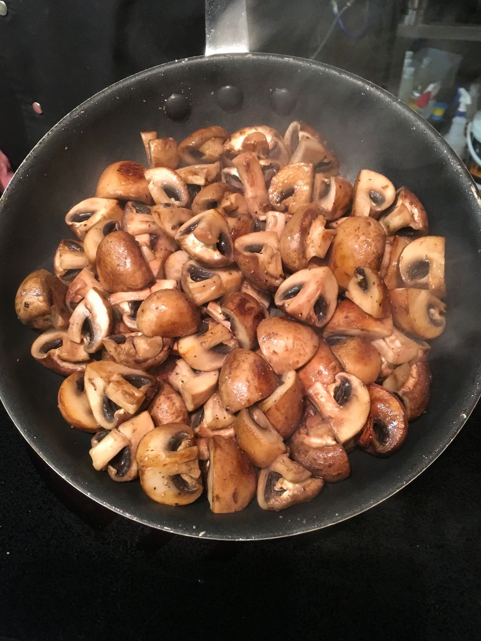 Take mushrooms and cut in quarters.  Add salt & Pepper and cook until slightly soft and golden brown.  Spread evenly over beef ribs.