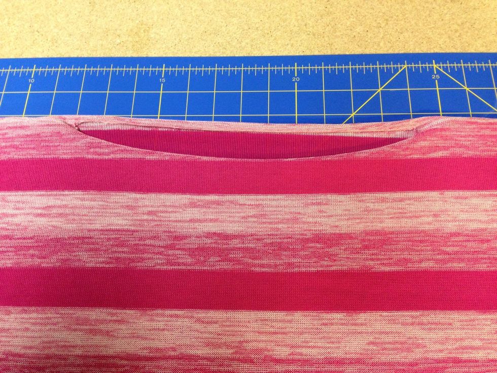 Take off dress and turn inside out. Lay flat making sure collar is still pulled down in front like you made it earlier.