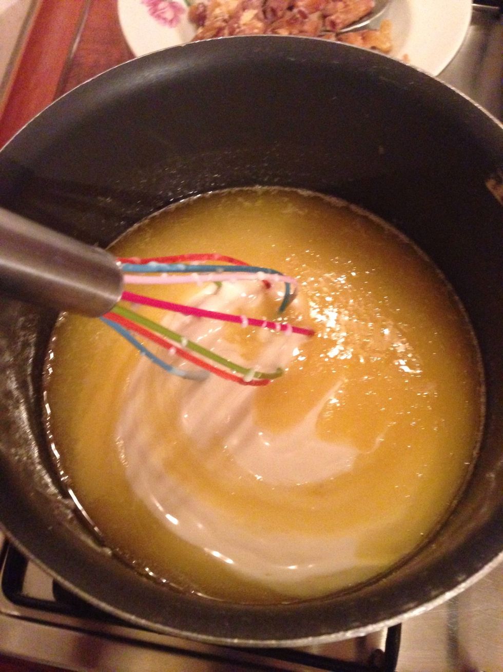 Take off the heat for a while, add in the condensed milk stir and bring back to the heat