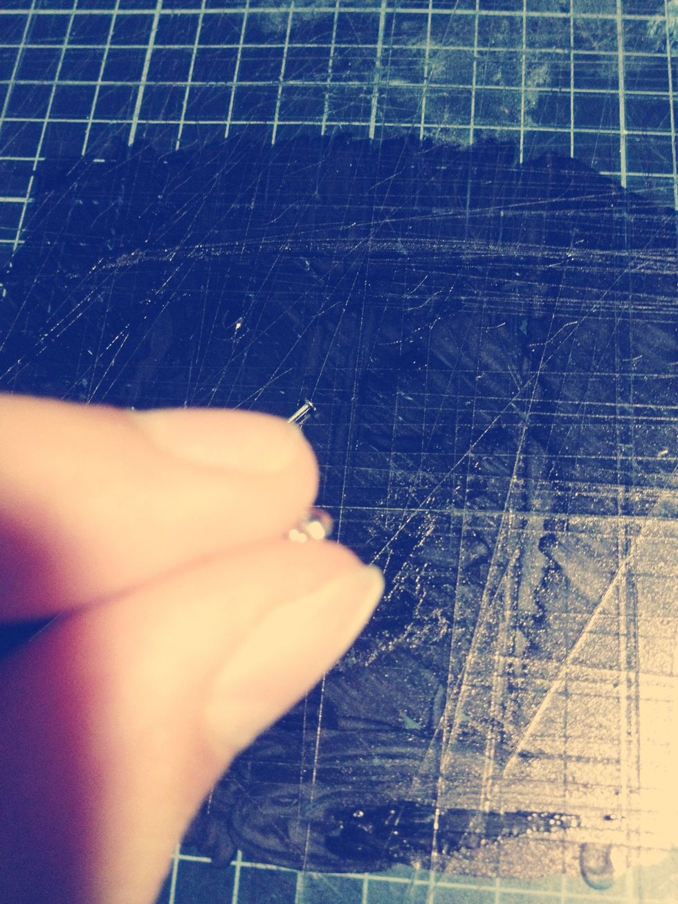 Take one cap bead. Mine are clear and round, but they can be any shape or colour depending whether you want them to stand out or not. Thread the bead onto the headpin.