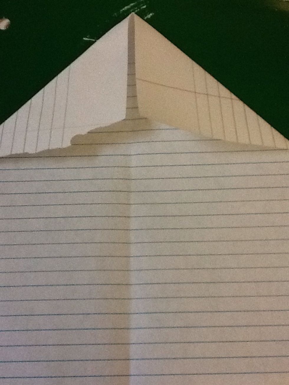Take one end and folded it to the center and do the same to the other side, so it will look like so.
