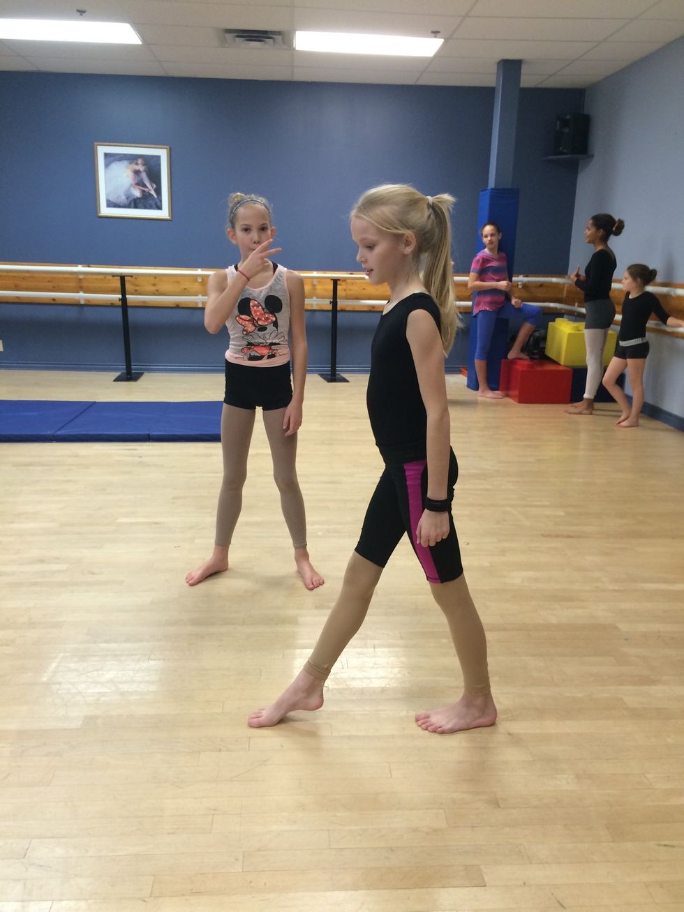 Take one more step and then bend your knees