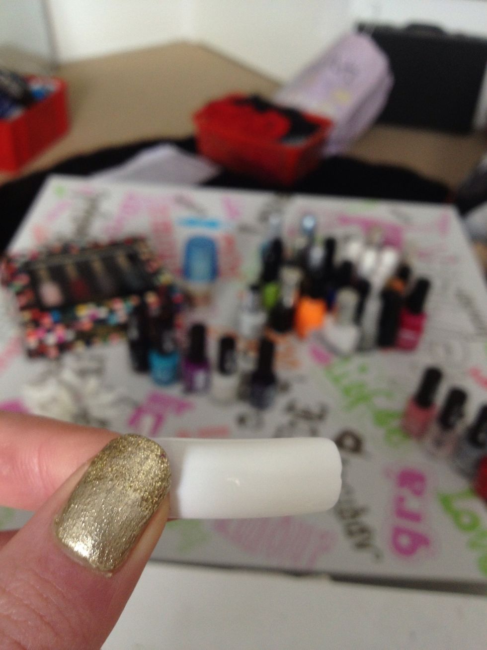 Take one of the fake nails